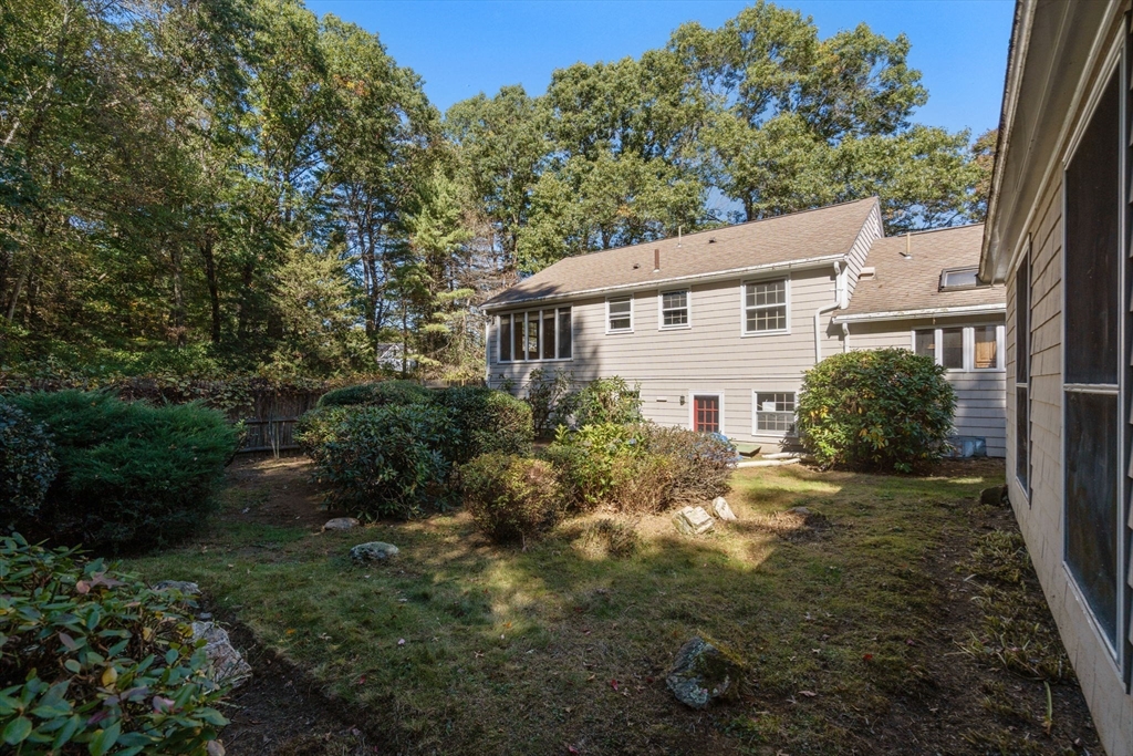 91 Glen Street Natick, MA 01760 - Photo 30 of 39 a view of a house with yard and plants