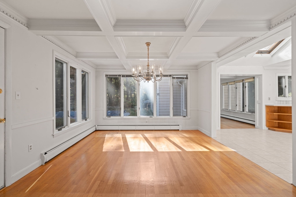 91 Glen Street Natick, MA 01760 - Photo 7 of 39 a view of an empty room with a window
