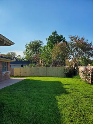 a view of a backyard with a garden