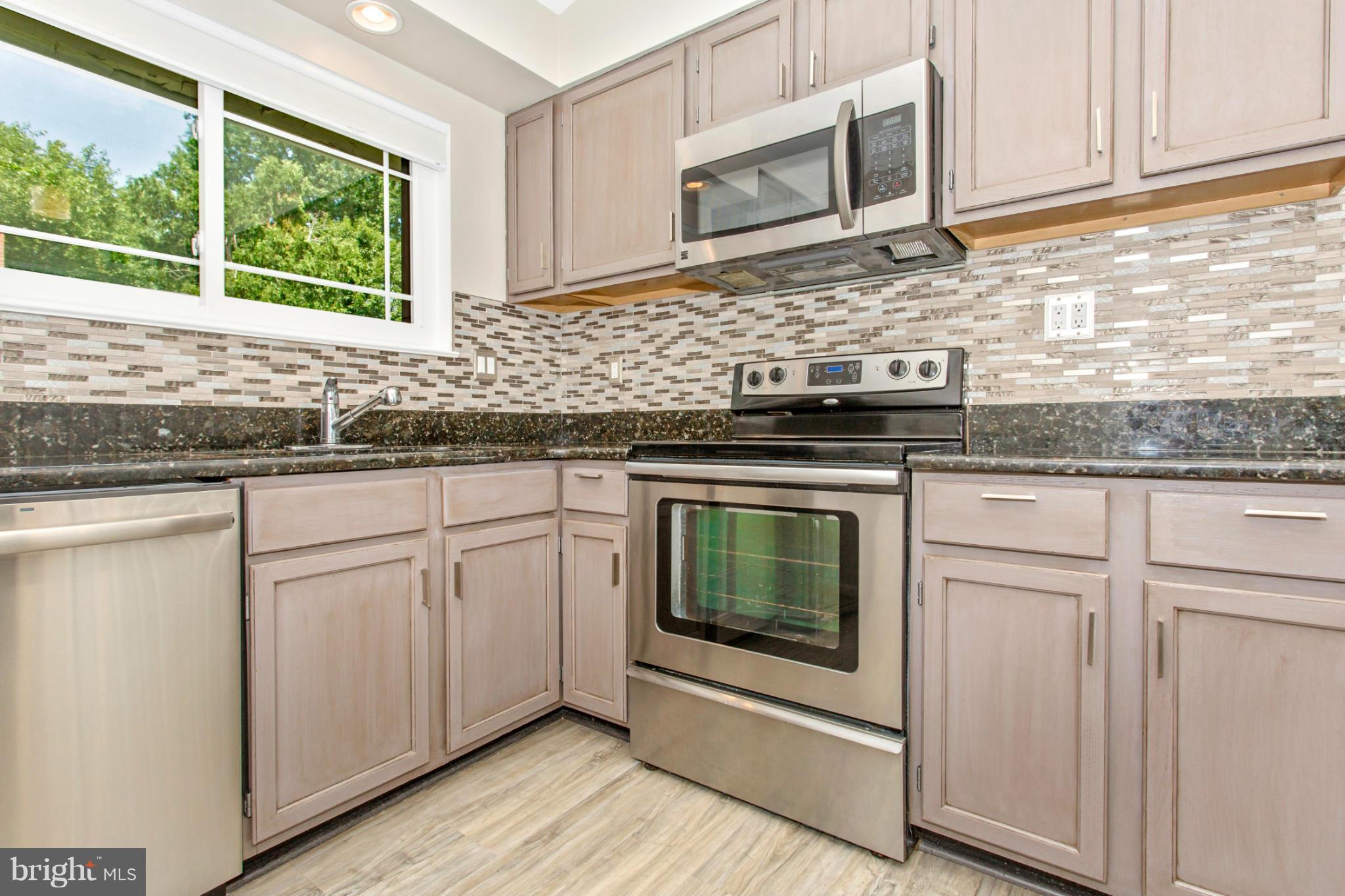 10923 Breewood Road Silver Spring, MD 20901 - Photo 7 of 30 Kitchen (Tile Back Splash and Granite Counters)