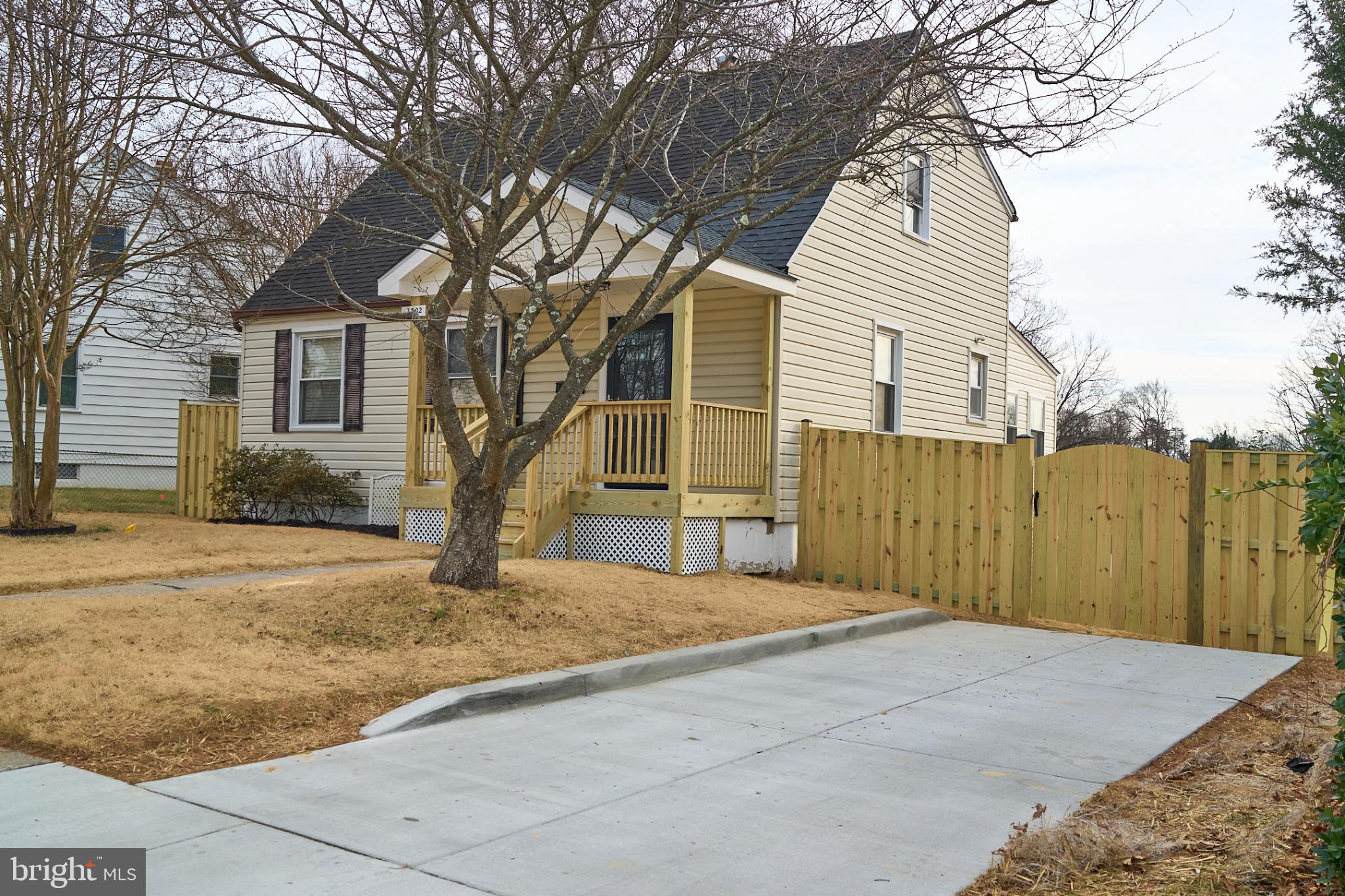 Charming home with inviting front porch.