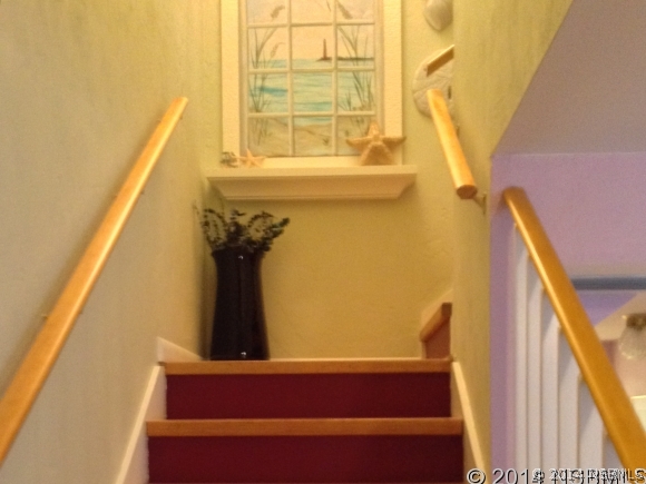 232 North Ridgewood Avenue, Unit A5 Edgewater, FL 32132 - Photo 8 of 15 a view of hallway with a large window