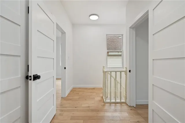 a view of a bathroom from the hallway