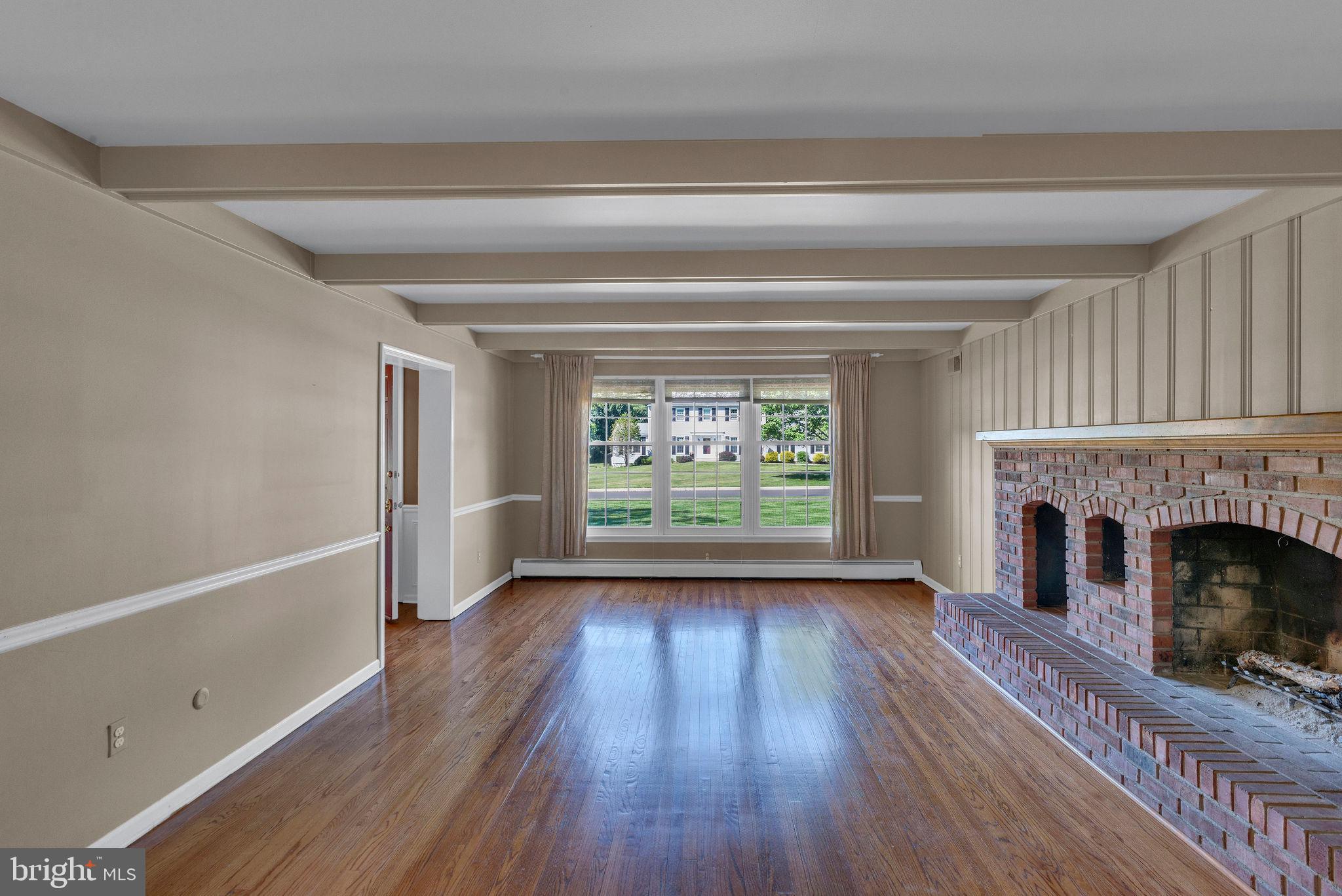 89 Buck Road Warrington, PA 18976 - Photo 7 of 53 Family room with Brick wood burning Fireplace