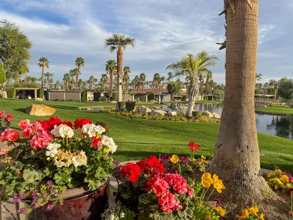 a view of swimming pool with outdoor seating