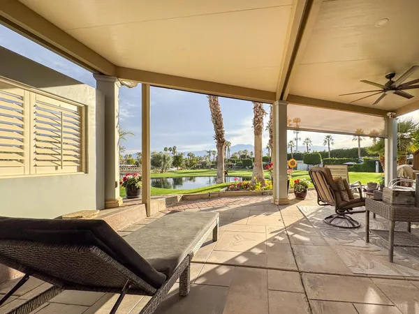 a kitchen with a sink and a refrigerator