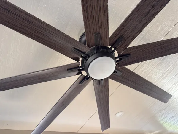 a view of a garage with parked cars