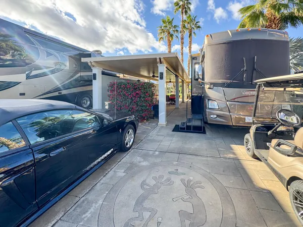 a view of swimming pool with a patio