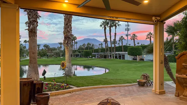 a view of a fountain in the garden