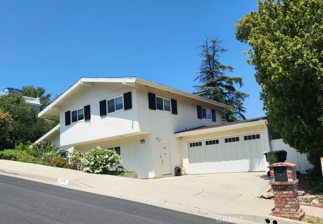 a house view with a outdoor space