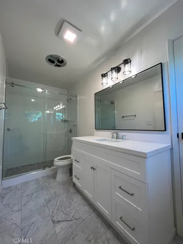 a view of a house with a back yard