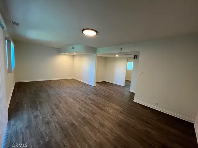 a bathroom with a toilet sink and shower