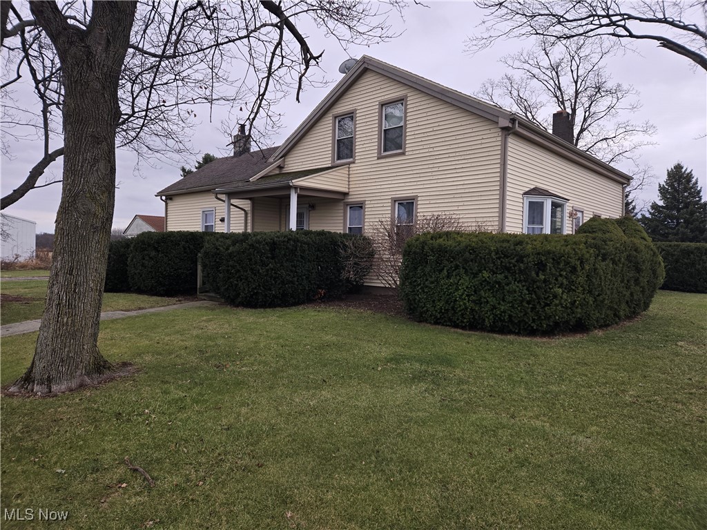 1962 Zenobia Road Norwalk, OH 44857 - Photo 23 of 30 View of property exterior with a lawn