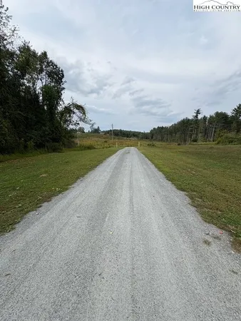 a view of a lake with a big yard
