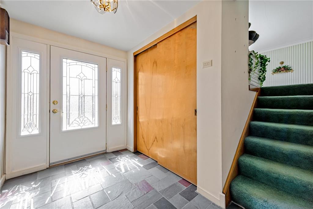 709 Indian Hill Road Rostraver Township, PA 15012 - Photo 12 of 25 a view of an entryway with wooden floor and windows