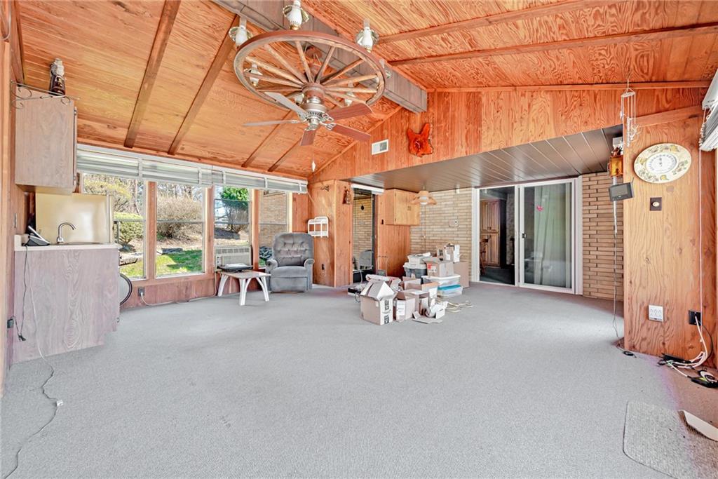 709 Indian Hill Road Rostraver Township, PA 15012 - Photo 18 of 25 a view of a patio with table and chairs