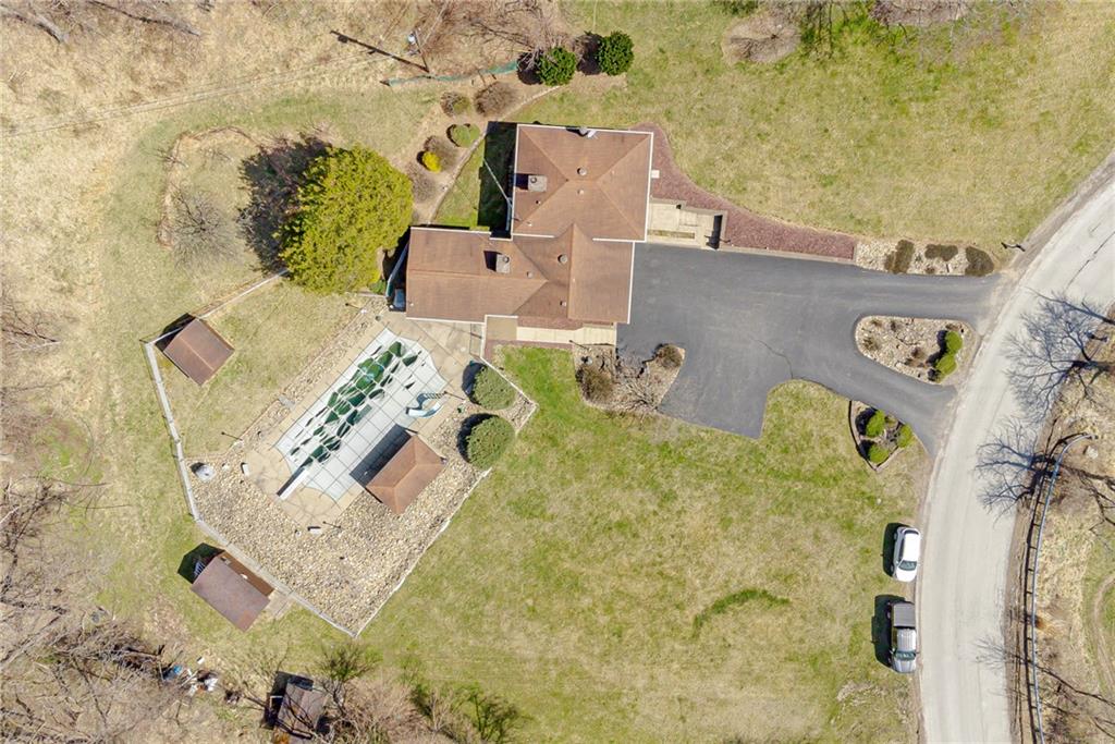 709 Indian Hill Road Rostraver Township, PA 15012 - Photo 5 of 25 an aerial view of a house with outdoor space
