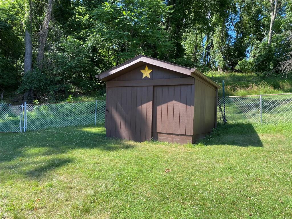 709 Indian Hill Road Rostraver Township, PA 15012 - Photo 8 of 25 a view of a tiny house with a yard