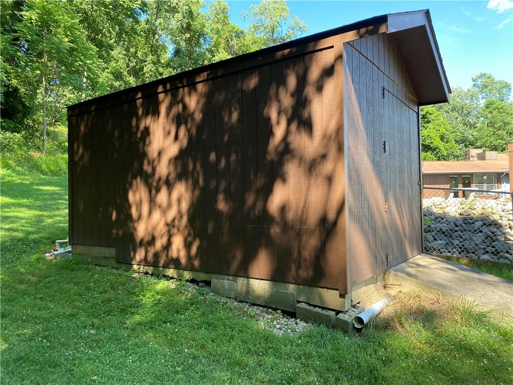 709 Indian Hill Road Rostraver Township, PA 15012 - Photo 10 of 25 a view of a yard with potted plants