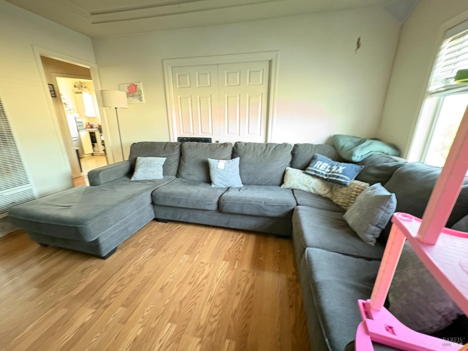 313 Roney Avenue Vallejo, CA 94590 - Photo 17 of 26 a living room with furniture and a couch