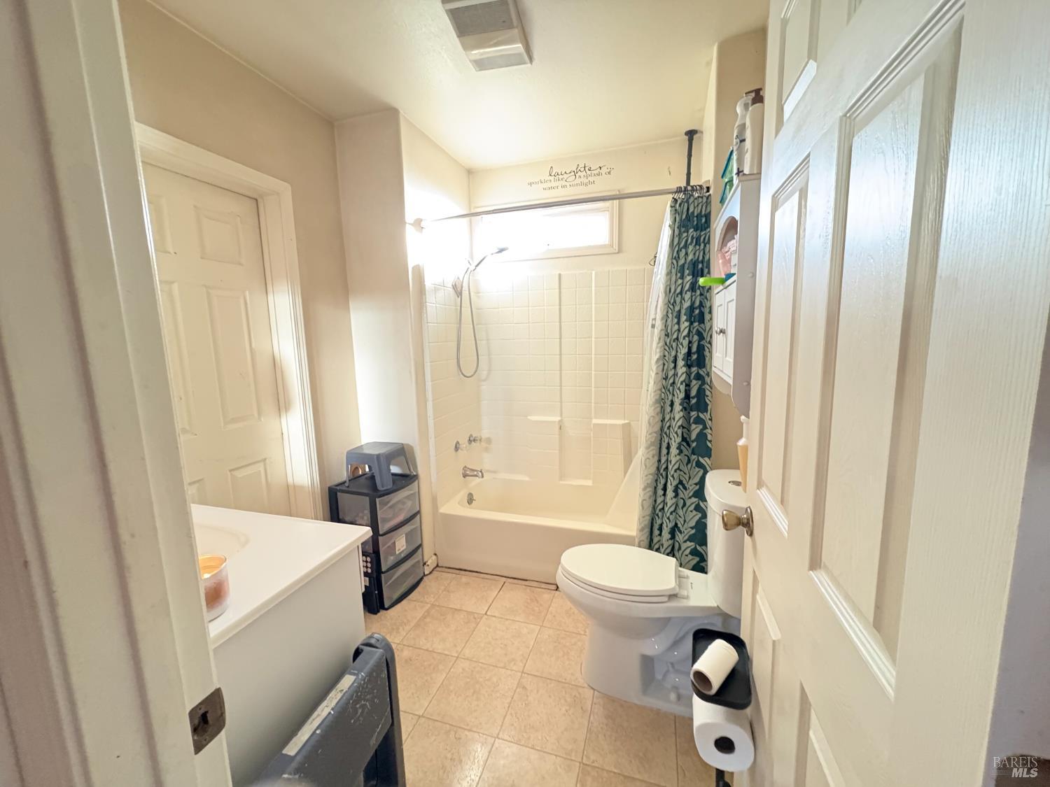 313 Roney Avenue Vallejo, CA 94590 - Photo 26 of 26 a bathroom with a bathtub toilet and sink