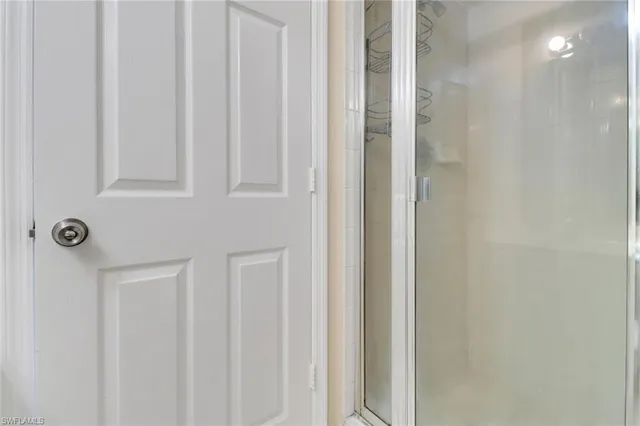 a view of an empty room with a large window