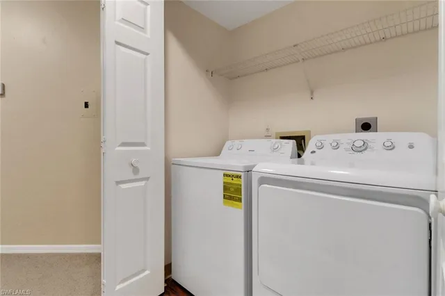 a view of an empty room with a large window