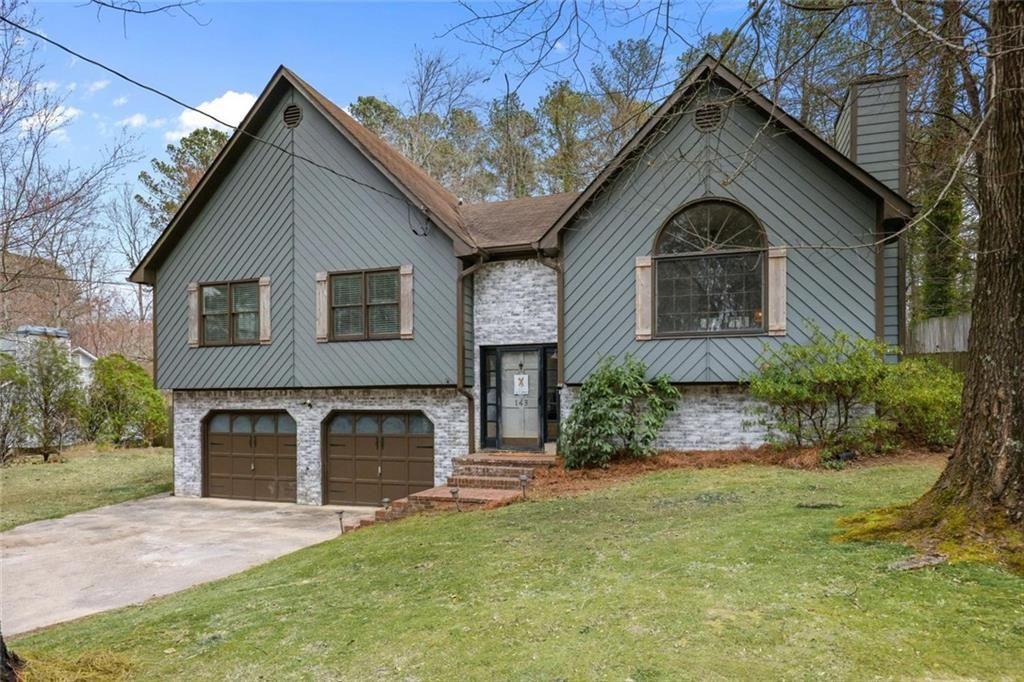 143 Frances Drive Dallas, GA 30157 - Photo 1 of 1 a front view of a house with a yard