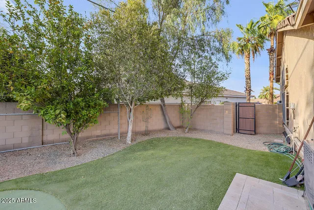 a view of a kitchen with a stove and a large window