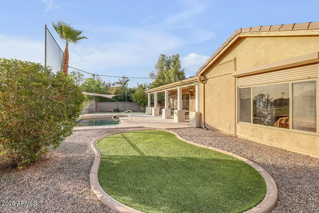 a view of a house with swimming pool