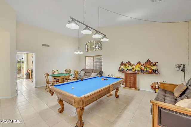 a very nice looking room with a table and chairs