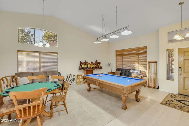 a room with furniture and chandelier