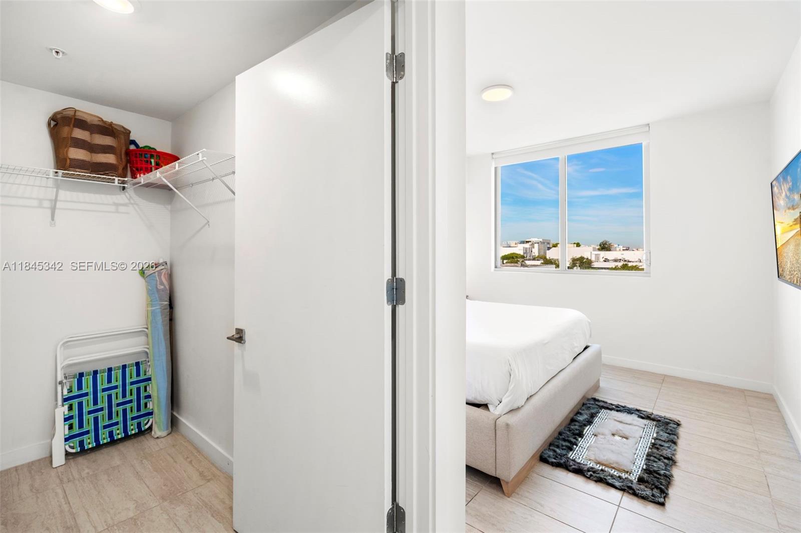 3900 Biscayne Boulevard, Unit S400 Miami, FL 33137 - Photo 13 of 50 a bathroom with a bathtub and a shower