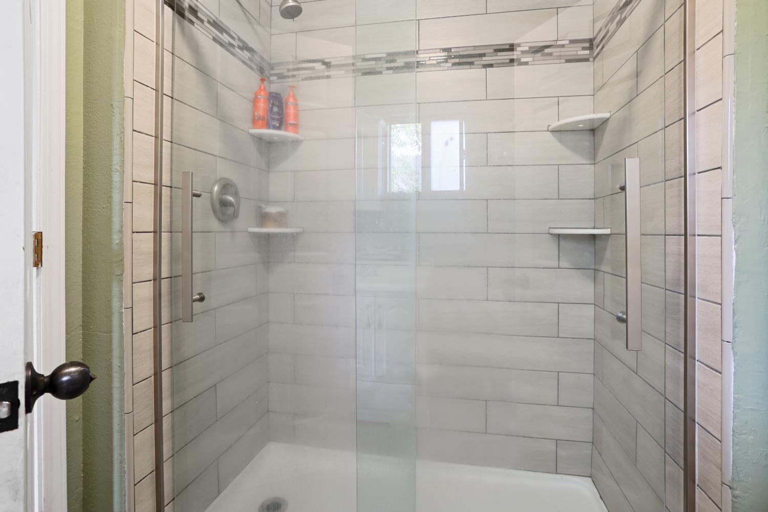 513 Harold Street Lodi, CA 95240 - Photo 13 of 29 a bathroom with a shower