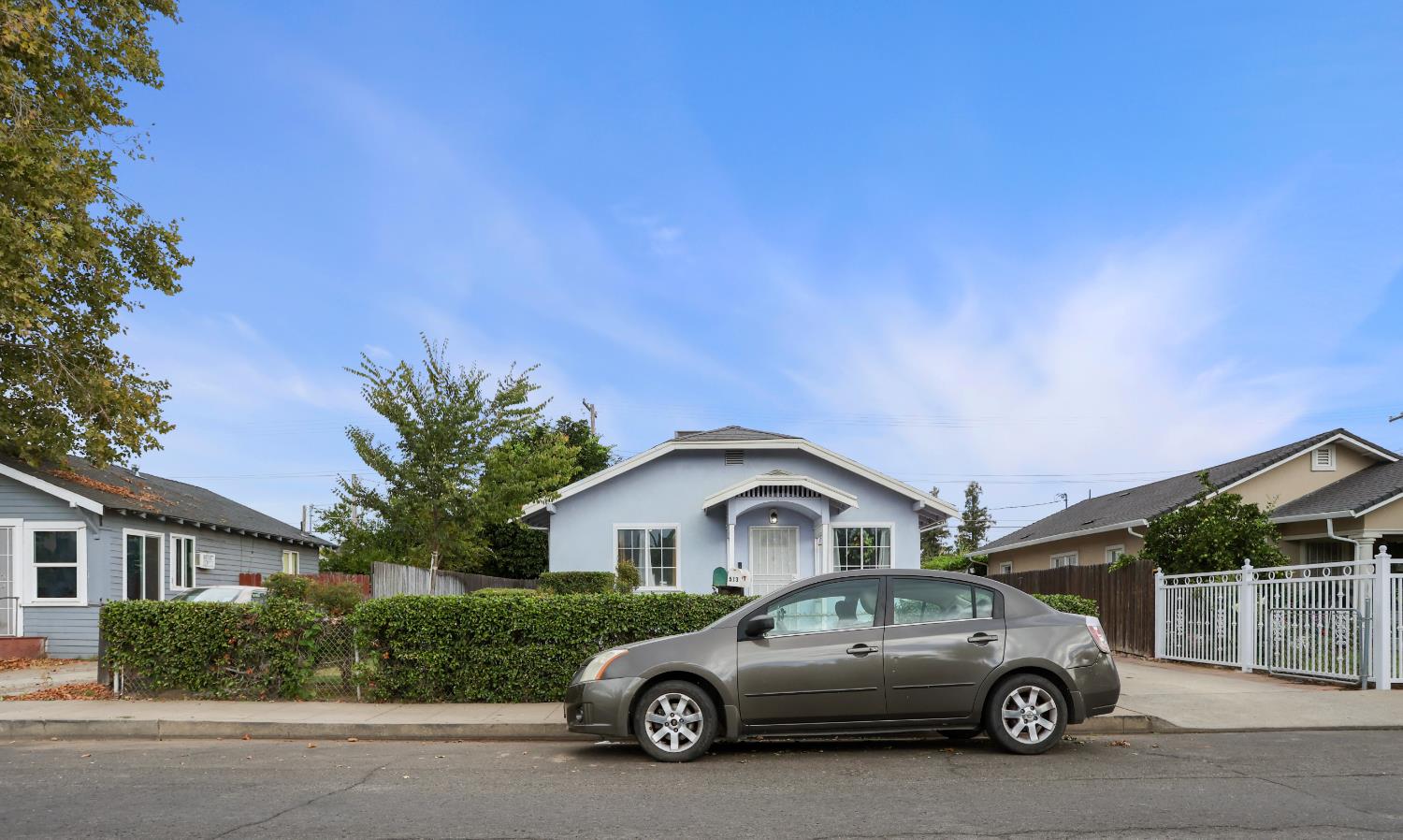 513 Harold Street Lodi, CA 95240 - Photo 2 of 29 a car parked in front of a house