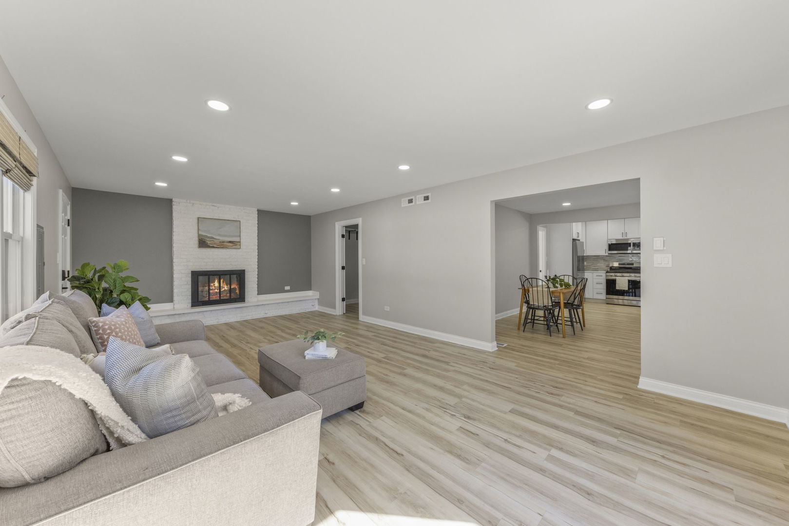 405 Turf Lane Wheaton, IL 60187 - Photo 11 of 29 a living room with furniture and a wooden floor