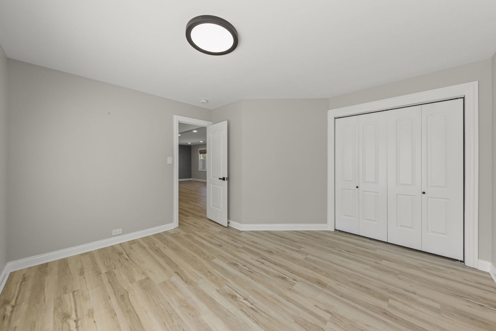 405 Turf Lane Wheaton, IL 60187 - Photo 19 of 29 a view of an empty room and wooden floor