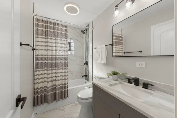 a view of a swimming pool with a yard