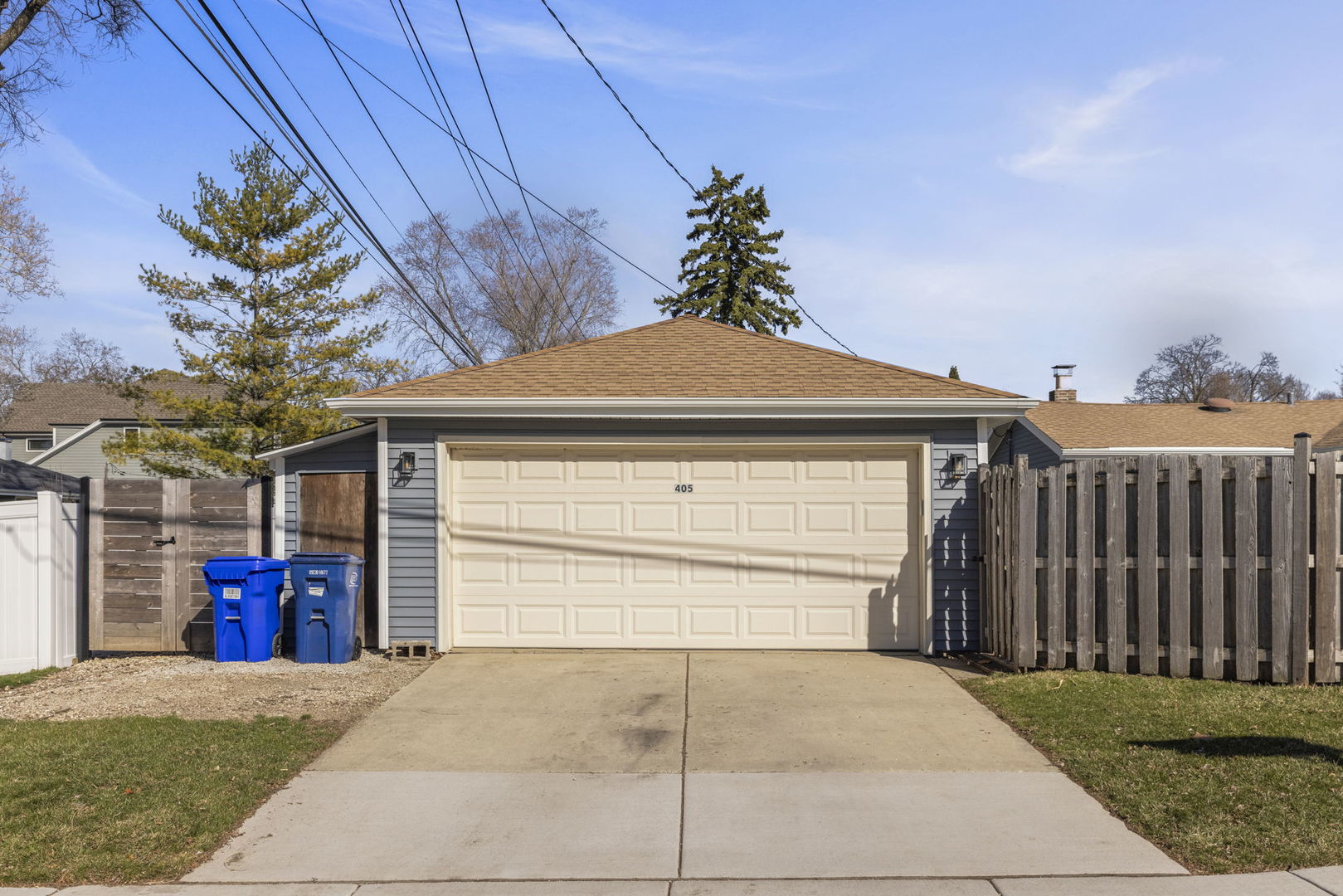 405 Turf Lane Wheaton, IL 60187 - Photo 28 of 29 a front view of a house with a yard and garage