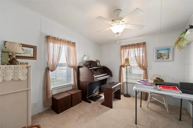 an aerial view of a swimming pool with outdoor space