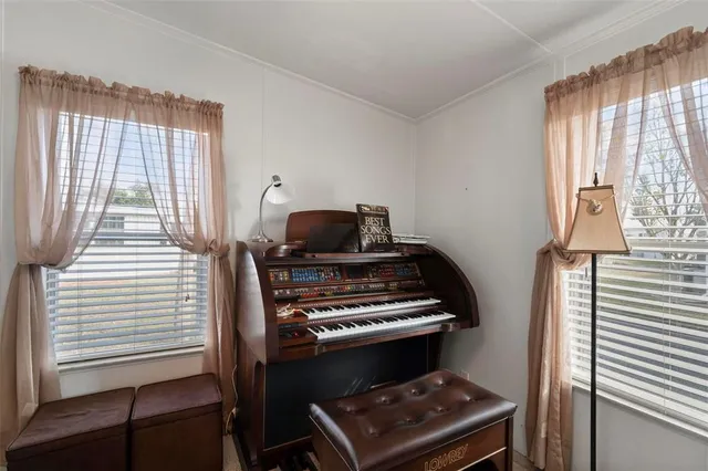 a sign on a street next to a road