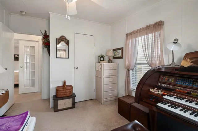 a view of a swimming pool with a table and chairs