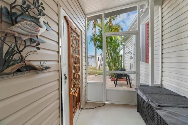 a view of a dining hall with lots of furniture and lots of furniture