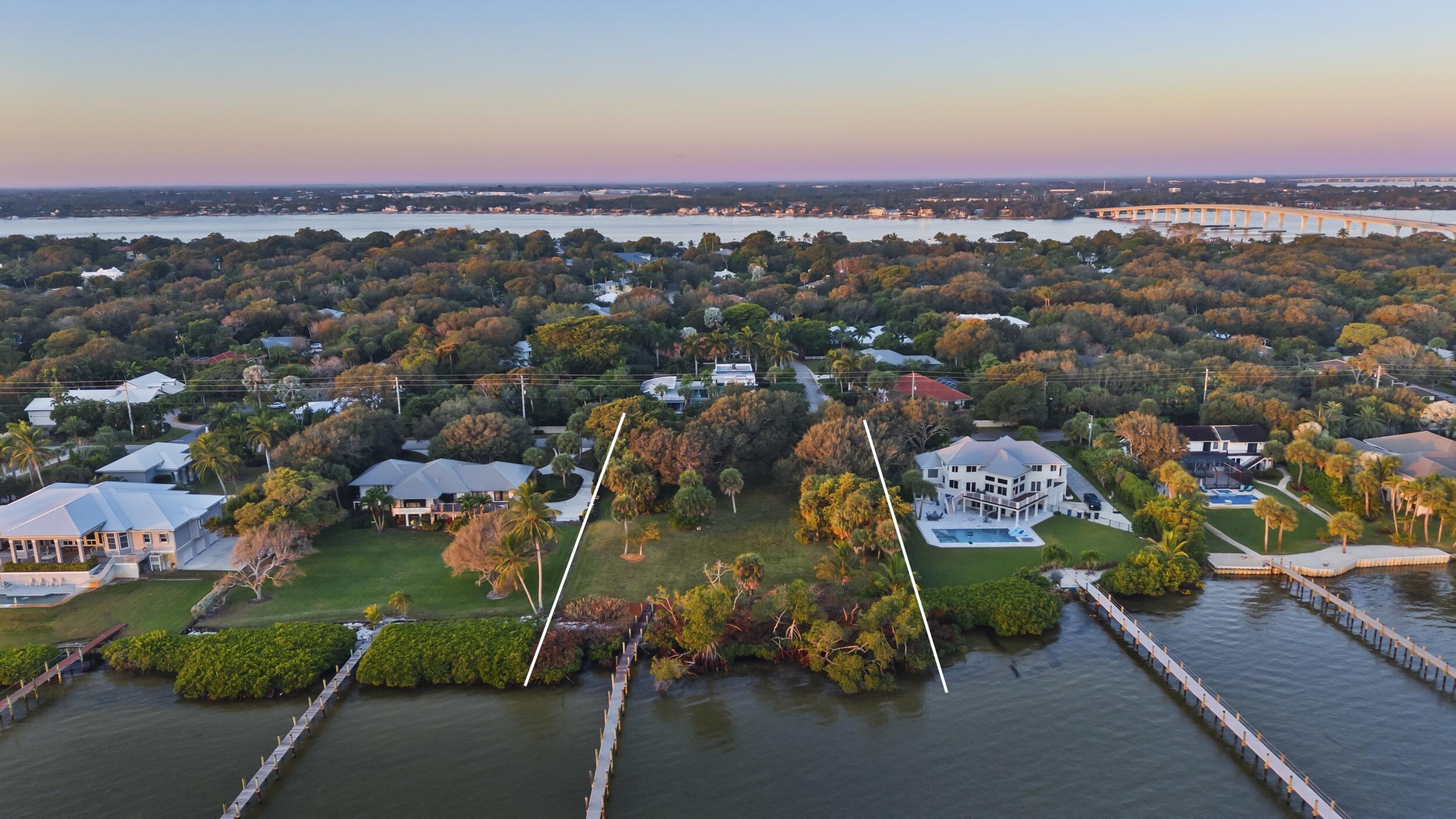 36 South Sewalls Point Road Sewall's Point, FL 34996 - Photo 13 of 38 an aerial view of a houses with a yard