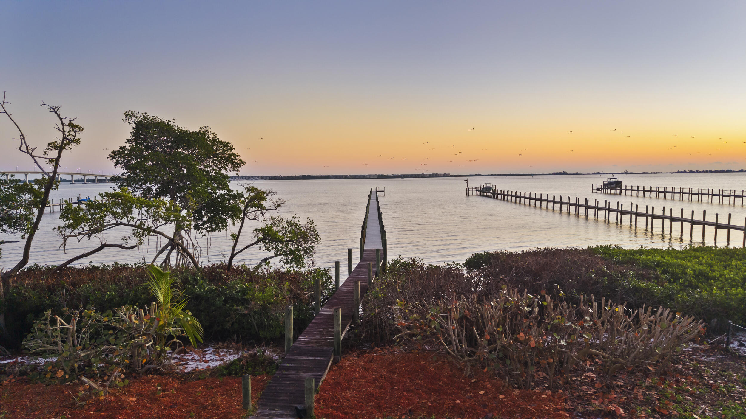 36 South Sewalls Point Road Sewall's Point, FL 34996 - Photo 17 of 38 a view of a lake with a outdoor space
