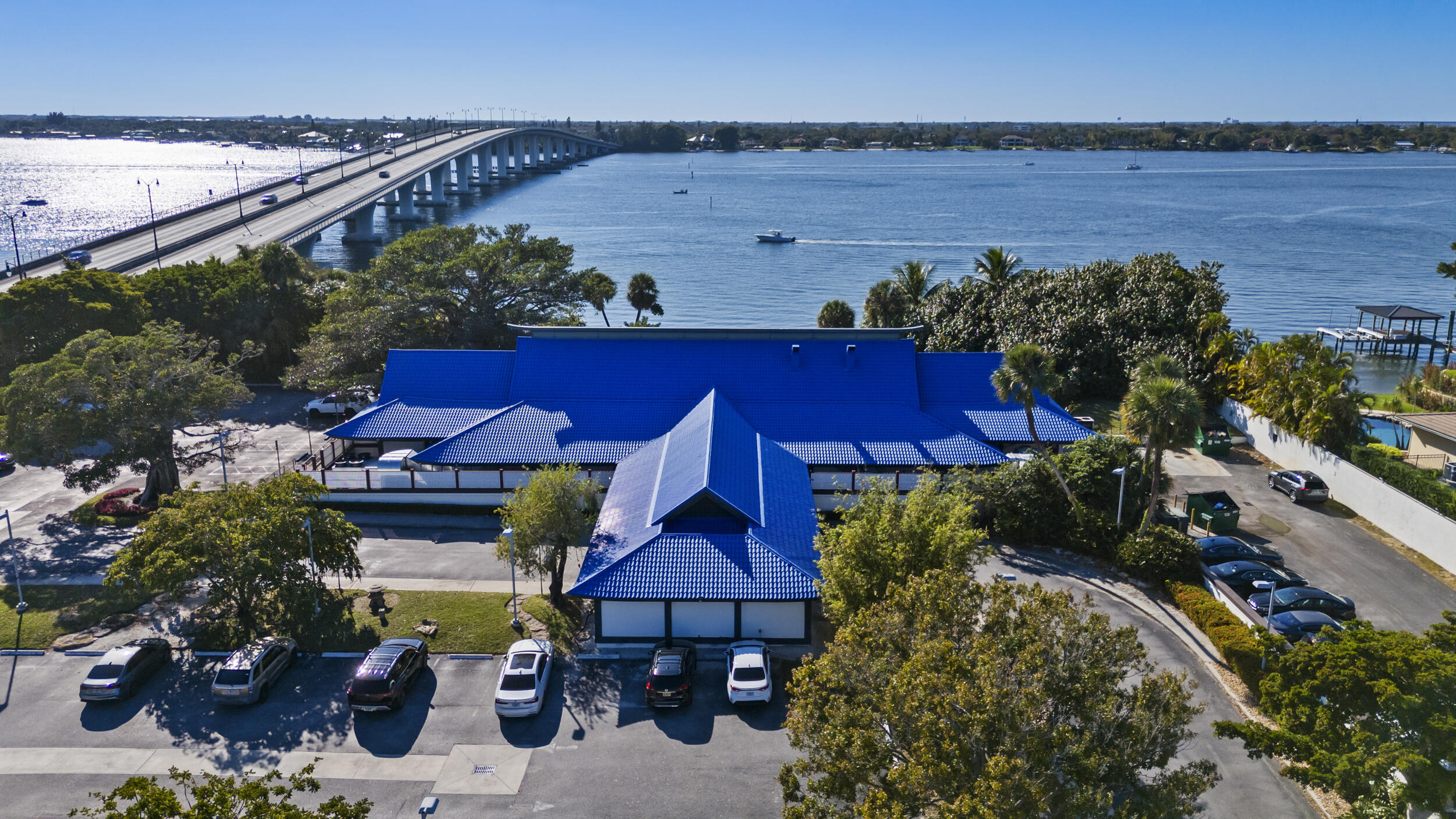 36 South Sewalls Point Road Sewall's Point, FL 34996 - Photo 29 of 38 a view of a balcony with chairs and potted plants