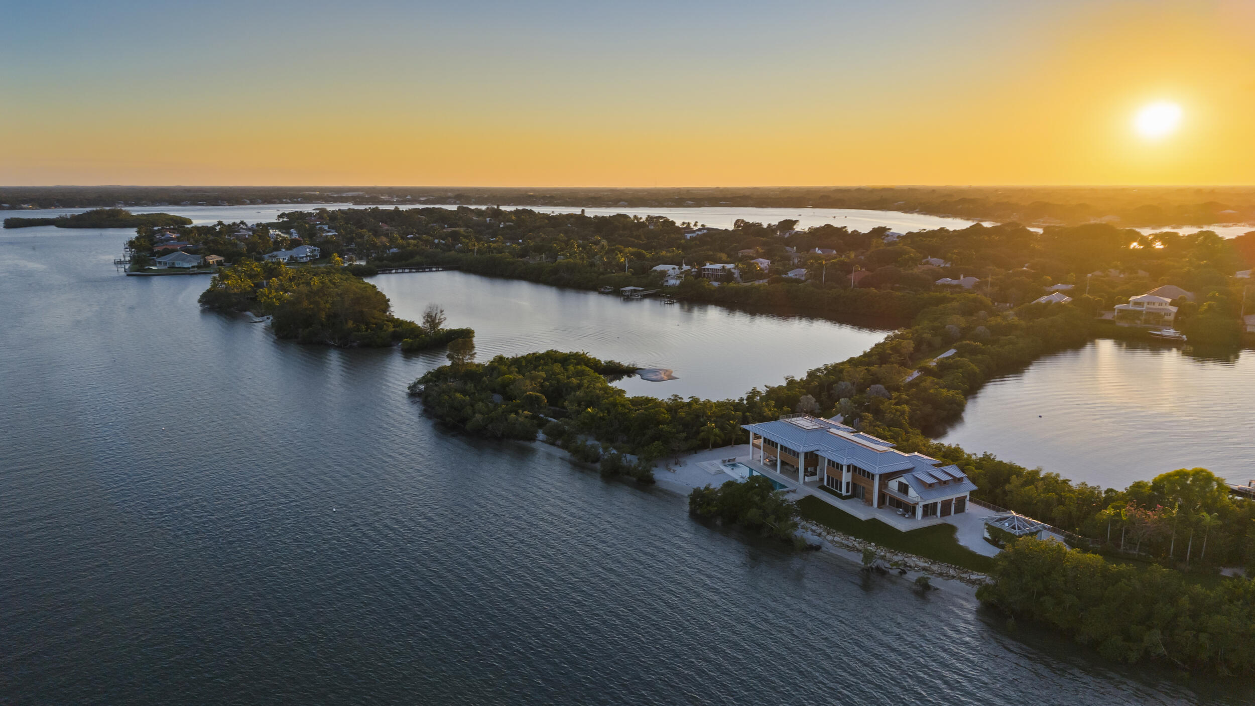36 South Sewalls Point Road Sewall's Point, FL 34996 - Photo 36 of 38 an aerial view of residential building and lake