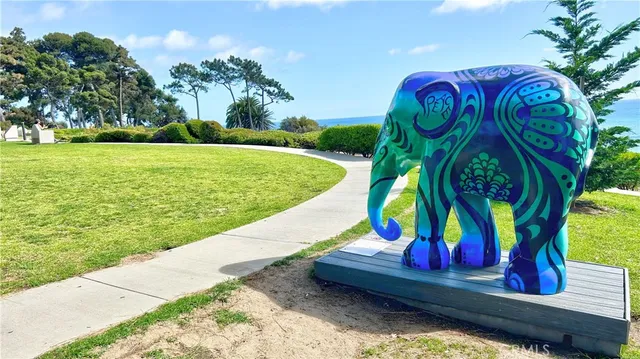 a view of swimming pool with a yard