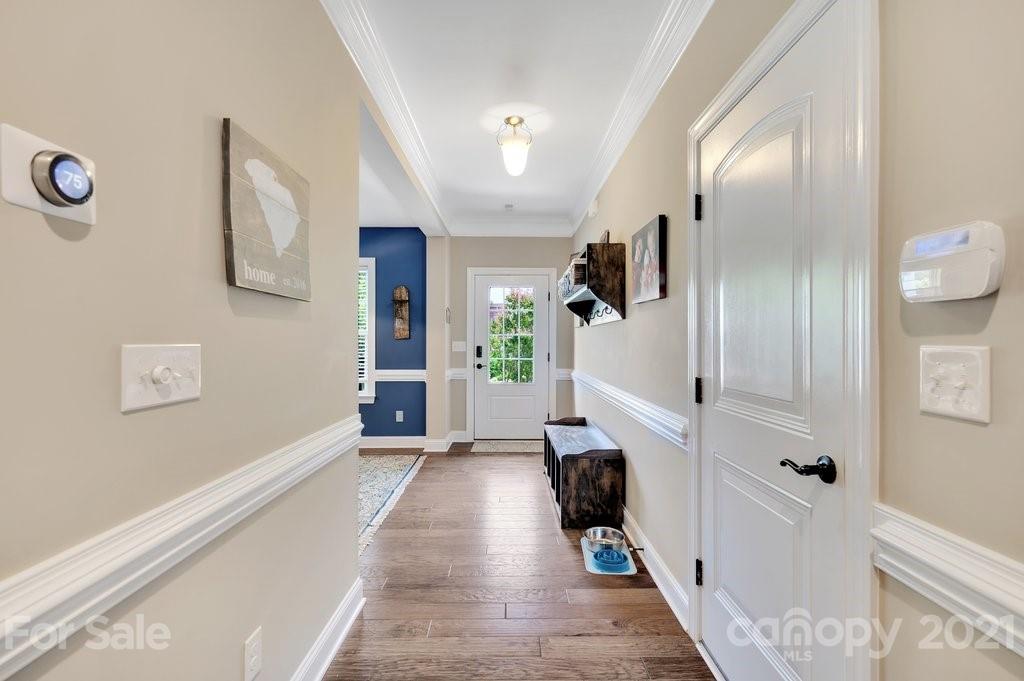 693 Old Cove Road Tega Cay, SC 29708 - Photo 15 of 38 a view of entryway with livingroom and furniture