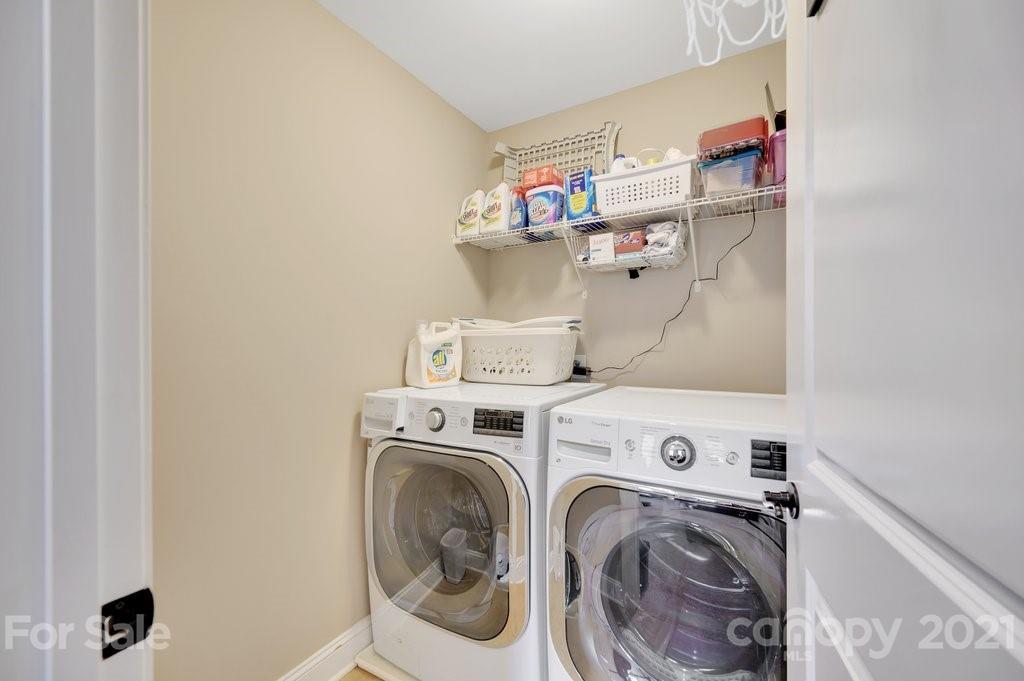693 Old Cove Road Tega Cay, SC 29708 - Photo 26 of 38 a utility room with dryer and washer